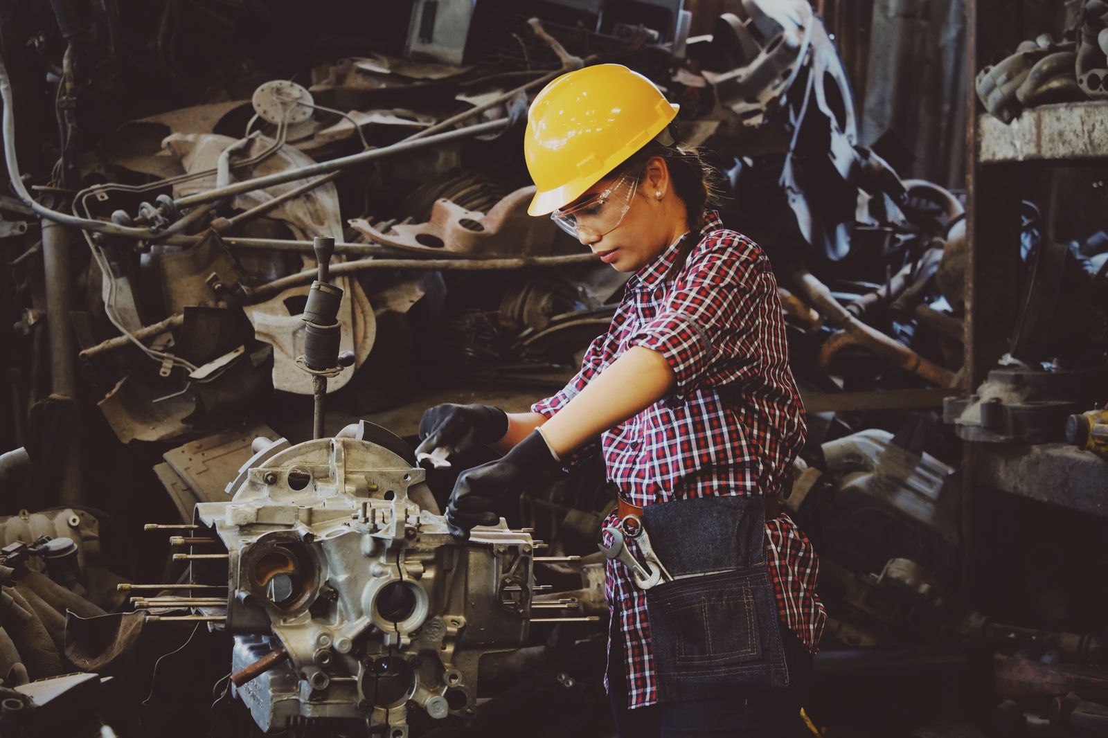 Technician servicing industrial tank equipment for American Vacuum in Morgan City, Louisiana